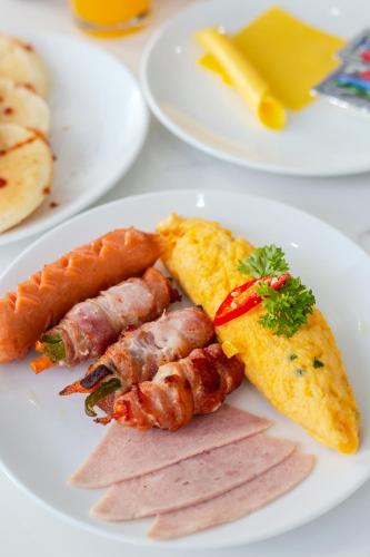 Comida en o cerca de este apartahotel