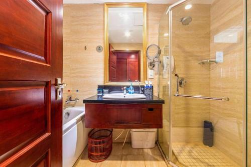 Ένα μπάνιο στο Qingdao Chengyang Detai Hotel