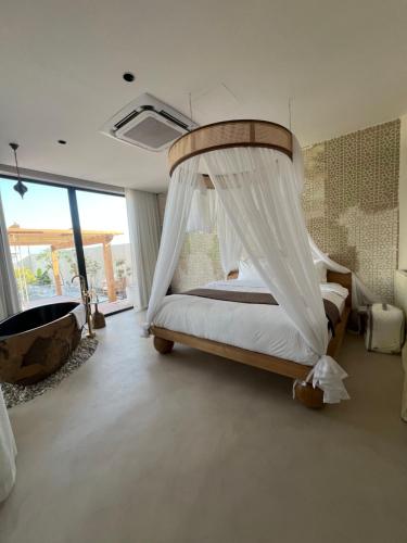 Llit o llits en una habitació de Paradise Vine