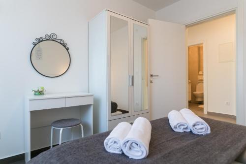 Postel nebo postele na pokoji v ubytování Villa Pjena