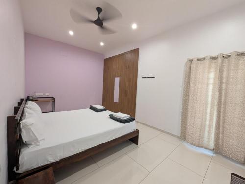 Ένα ή περισσότερα κρεβάτια σε δωμάτιο στο Sitara By avea- Beautiful getaway flat for you!