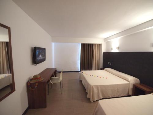 Postel nebo postele na pokoji v ubytování Hotel Astoria Park
