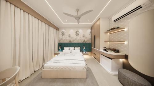 a bedroom with two beds and a sink at The White Castle Hotel in Mysore