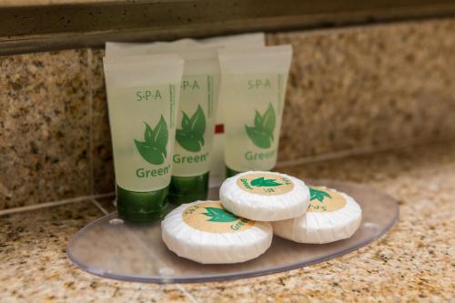 a plate with four spa products on a counter at Pelican Inn in Monterey