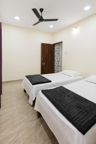 Postel nebo postele na pokoji v ubytování 2BHK Apartment Close to Airport and City Center