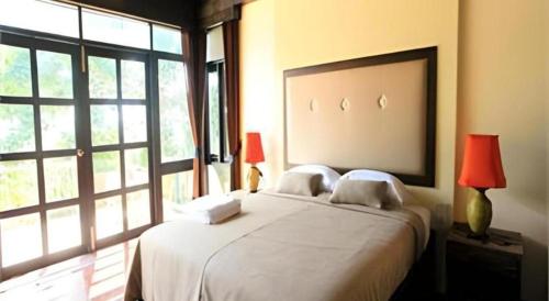 Ένα ή περισσότερα κρεβάτια σε δωμάτιο στο Balcony Hill Resort