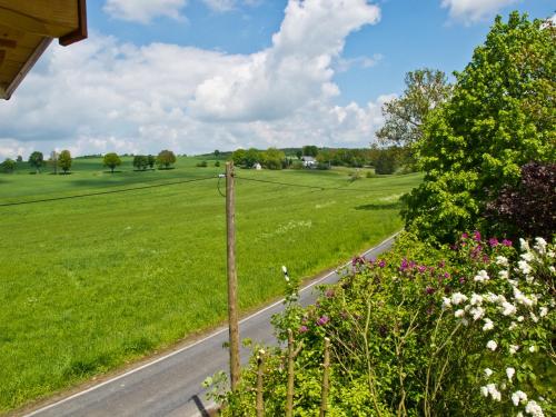 an empty road in the middle of a field at Bahnwärterhaus in Droßdorf