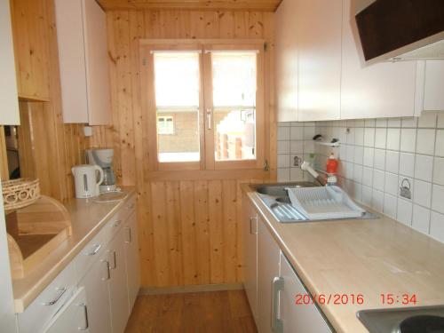 Kuchyň nebo kuchyňský kout v ubytování Chalet Grazia