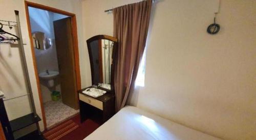 Ένα μπάνιο στο OYO 1167 Rest and Go Hotel Klang