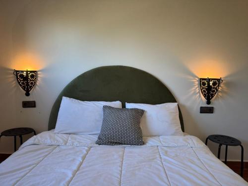 Ένα ή περισσότερα κρεβάτια σε δωμάτιο στο Apartment Heart of Medina Tetuan 3 min airport