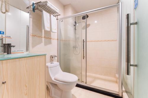 Ένα μπάνιο στο Foshan Xingdu International Hotel