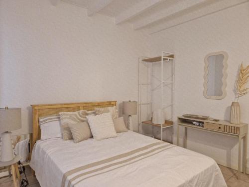 Un pat sau paturi într-o cameră la Villa Corail Gorge