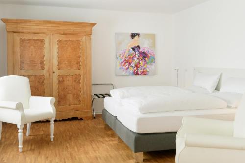 Giường trong phòng chung tại HOMEFY - Gasthaus Düsseldorf - Meerbusch