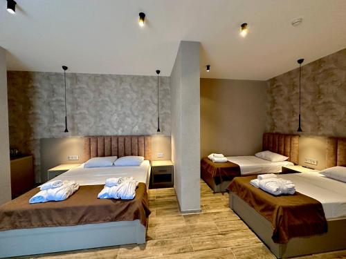 Ένα ή περισσότερα κρεβάτια σε δωμάτιο στο Hotel Neon