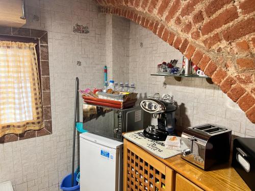 Η κουζίνα ή μικρή κουζίνα στο Luigi's Apartment