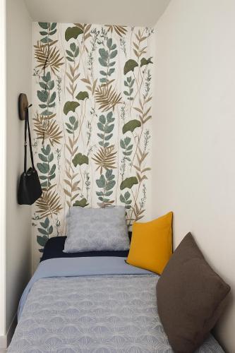 Llit o llits en una habitació de Charmant studio à Tours