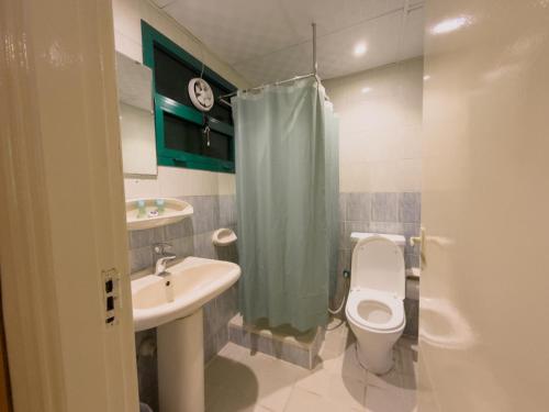 Koupelna v ubytování Sama Hotel