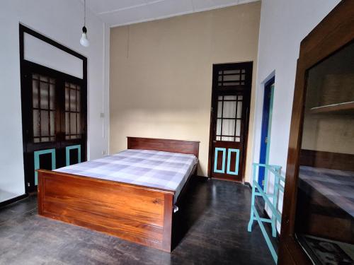 Ένα ή περισσότερα κρεβάτια σε δωμάτιο στο margosa186