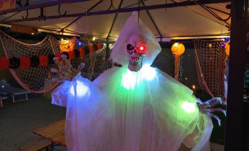 a person wearing a skeleton costume with lights on at Mobile Fontana Oasis in Castelnuovo del Garda