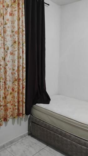 En eller flere senge i et værelse på Recanto da Helo