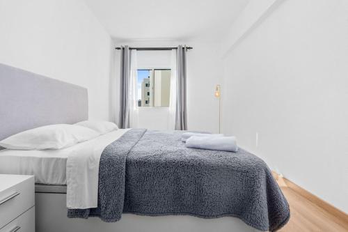 En eller flere senge i et værelse på Orion's Retreat Garajau, Caniço