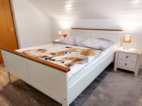 En eller flere senge i et værelse på Zum Eiderweg Hennstedt