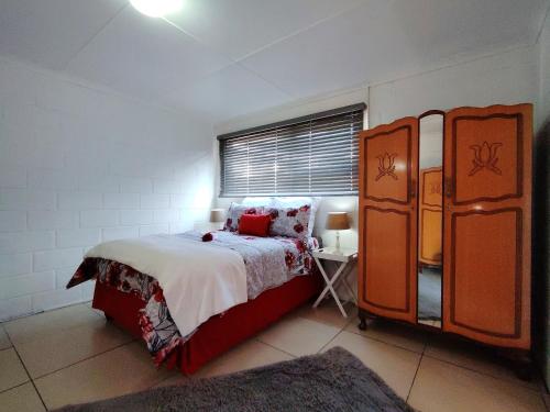 Ένα ή περισσότερα κρεβάτια σε δωμάτιο στο Sundees Cottage