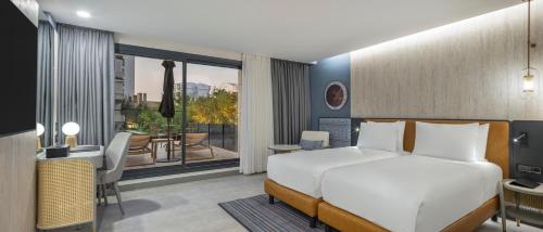 Postel nebo postele na pokoji v ubytování MERCURE ANTALYA KONYAALTI