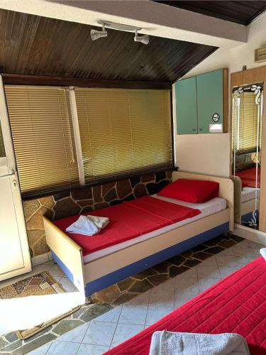 Giường trong phòng chung tại Villa Bella Veles