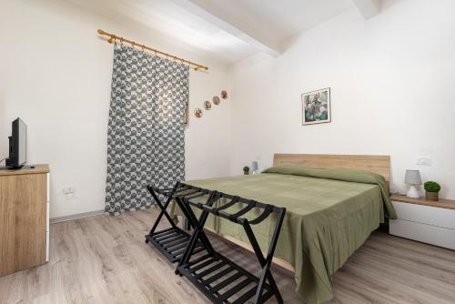 Ένα ή περισσότερα κρεβάτια σε δωμάτιο στο AltoRione