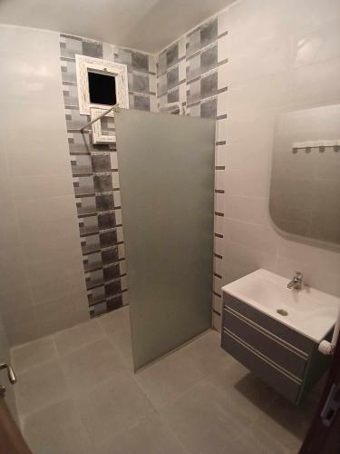Ένα μπάνιο στο Bel appartement