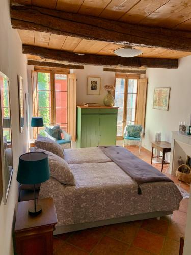 Postel nebo postele na pokoji v ubytování La Maison Provençale