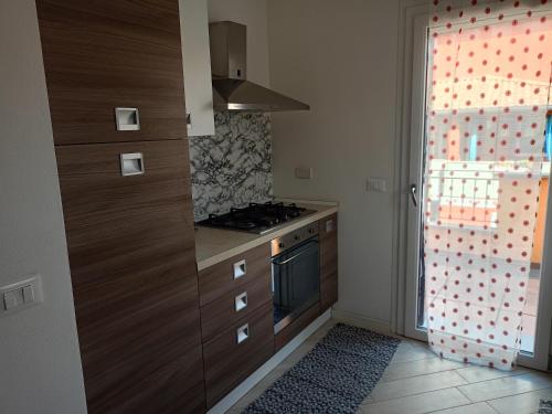 Kuchyň nebo kuchyňský kout v ubytování Corte Don Bosco 3