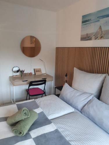 Postel nebo postele na pokoji v ubytování Madlen Apart