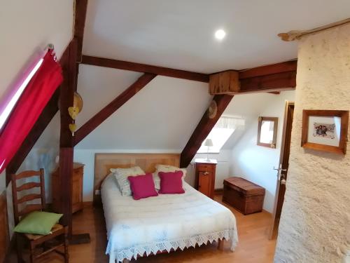 Postel nebo postele na pokoji v ubytování À L'ancienne Boulangerie - Chambres