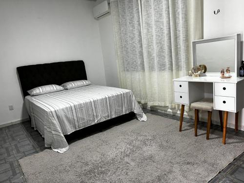 Ένα ή περισσότερα κρεβάτια σε δωμάτιο στο Casa Soure