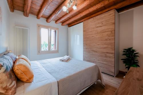 Postel nebo postele na pokoji v ubytování Jungle Veranda con Ristorante,Vicenza e Padova