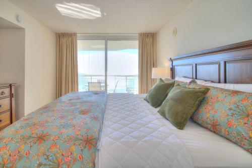 Katil atau katil-katil dalam bilik di Crescent Shores South - 608