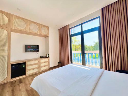 Ένα ή περισσότερα κρεβάτια σε δωμάτιο στο Soffia Hotel