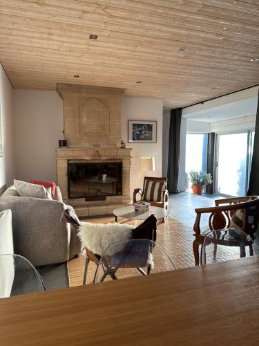 Posezení v ubytování Charmante maison à 10 mn d'Angers