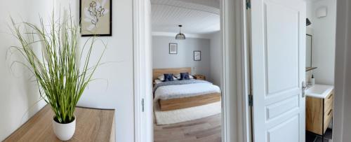 Postel nebo postele na pokoji v ubytování La Maison d'Abel, Séjournez à Chablis