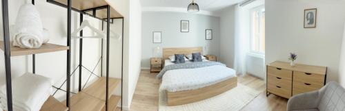 Postel nebo postele na pokoji v ubytování La Maison d'Abel, Séjournez à Chablis