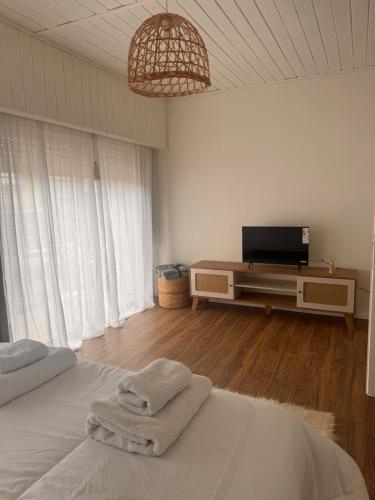 Giường trong phòng chung tại Dptos Rivadavia