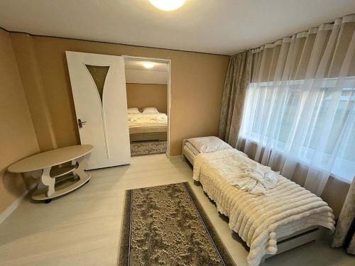 Ένα ή περισσότερα κρεβάτια σε δωμάτιο στο Modern house