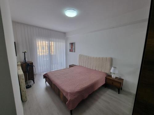 Postel nebo postele na pokoji v ubytování FR Residence