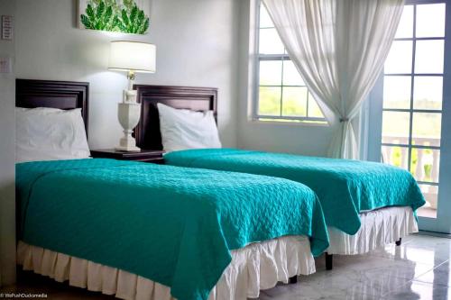 Katil atau katil-katil dalam bilik di ZenBreak Castles in Paradise 2bd Apt C3