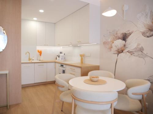 Kuchyň nebo kuchyňský kout v ubytování Apartament MAXIM