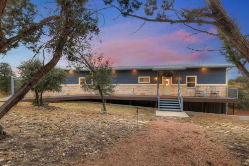 a home with a large house at Esperanza Ranch w/Hot-tub, Fire pit, Gorgeous View in Stonewall