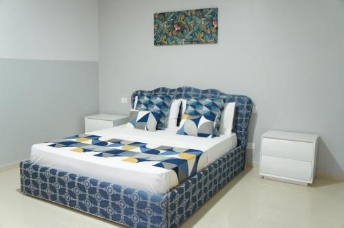Ένα ή περισσότερα κρεβάτια σε δωμάτιο στο Ilidia Guest House