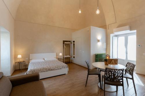 Voodi või voodid majutusasutuse La Terrazza dei Ricordi toas